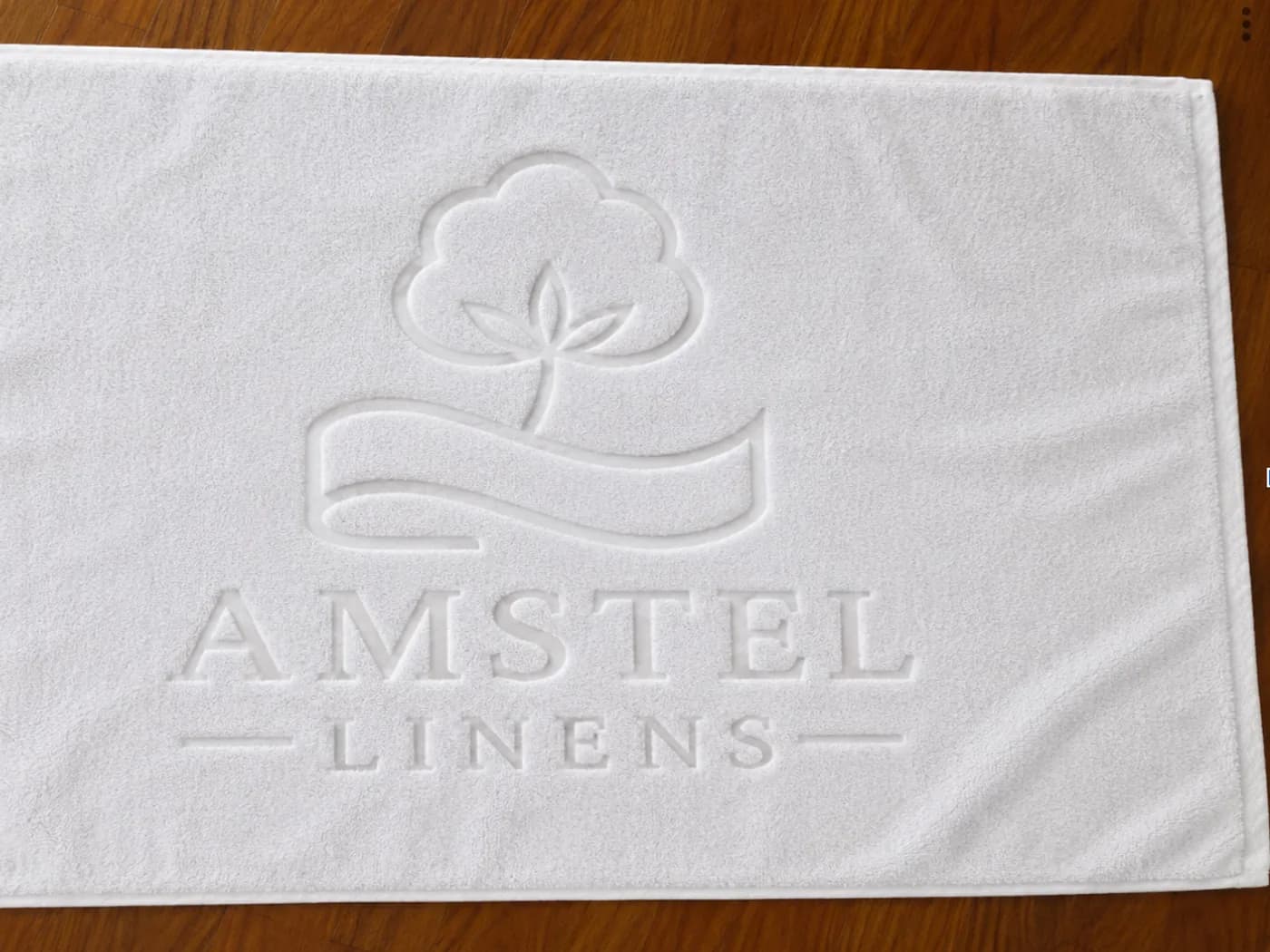 White hotel bath mat for guest bathrooms